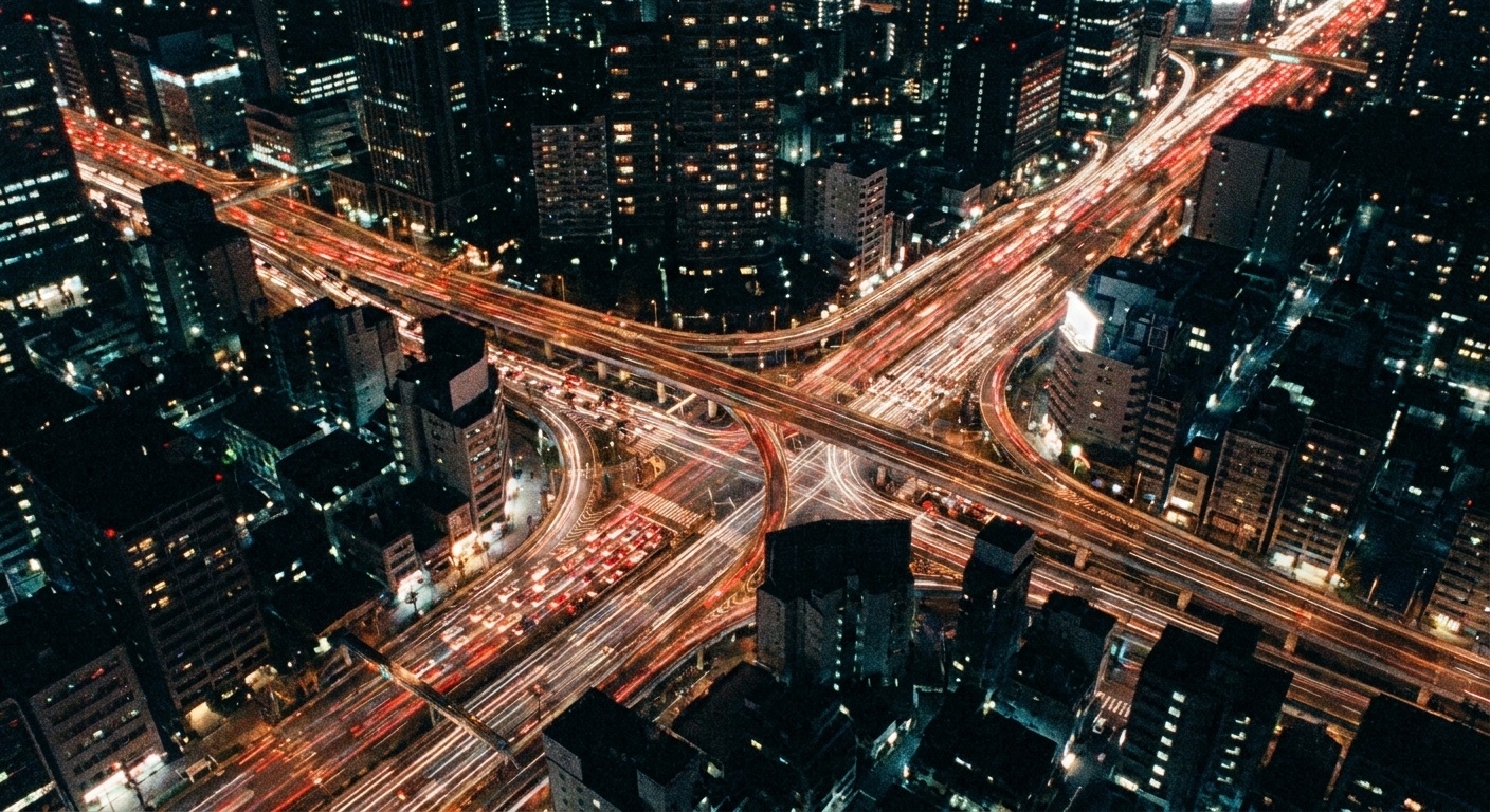 A night cityscape with streams of car lights forming long luminous trails, seen from above, creating a dense pattern of motion, documentary film still