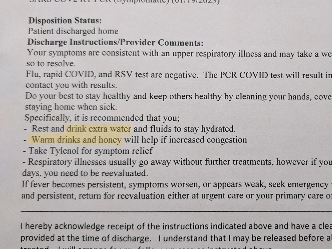 A person holding a small stack of urgent care discharge paperwork and a pen while sitting in a waiting room chair