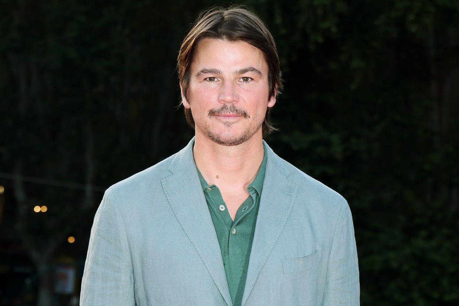 Josh Hartnett as Jeremy Crawford in a dark interior scene, looking conflicted and grief-worn.