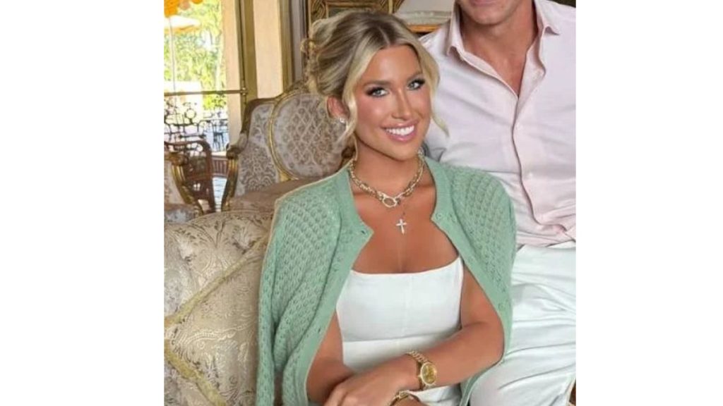 Savannah Chrisley smiling beside Jason at an event, both facing camera with neutral background to clearly identify the couple discussed in the section.