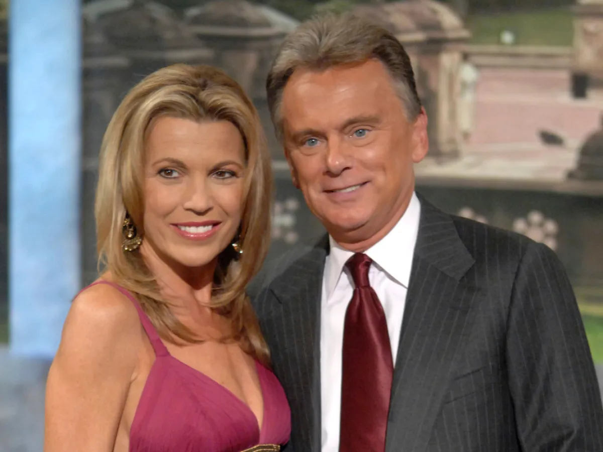 Vanna White and Pat Sajak in a throwback moment involving a pie gag